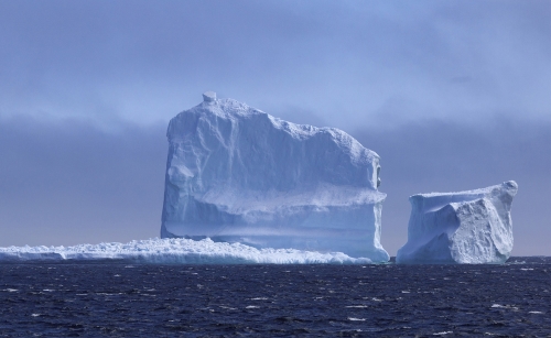 long shot of iceberg, representing how the issues we are dealing with now with respect to sexism, misogynoir/misogyny and patriarchy are just the tip of the iceberg